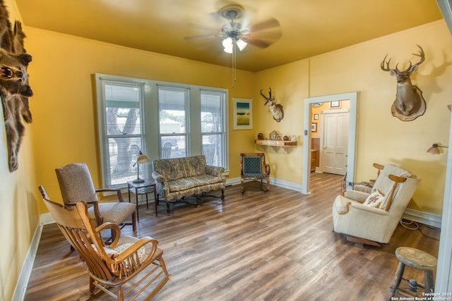 interior space featuring ceiling fan and wood-type flooring