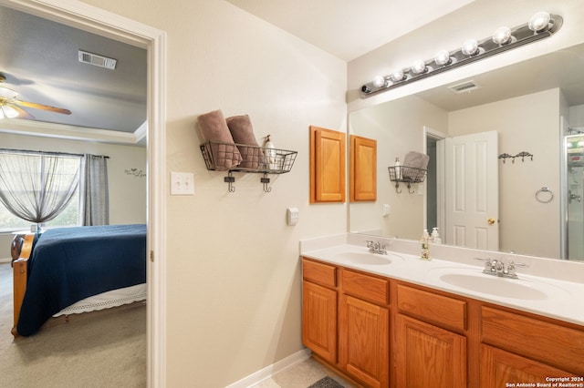 bathroom with ceiling fan and vanity