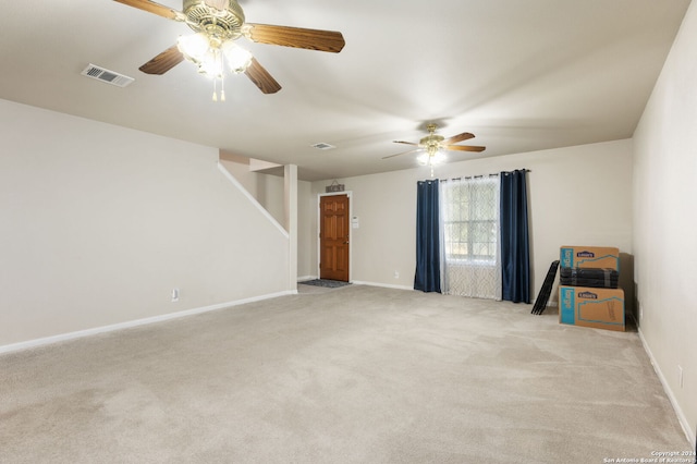 carpeted empty room with ceiling fan