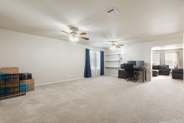 interior space featuring ceiling fan