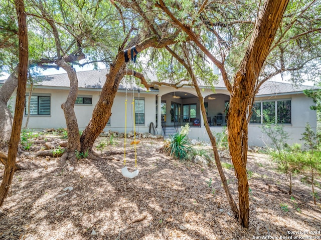 ranch-style house with a patio