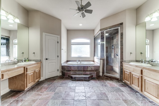 bathroom featuring ceiling fan, shower with separate bathtub, tile patterned floors, and vanity