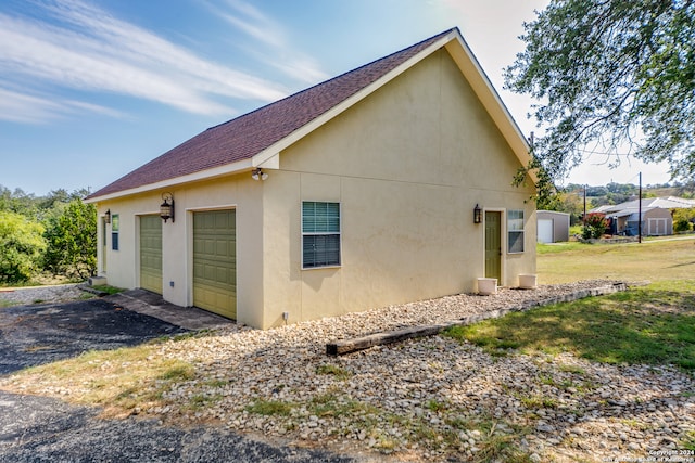 view of home's exterior featuring a garage