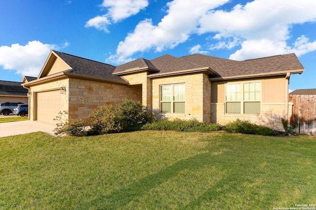 ranch-style home featuring a front yard and a garage