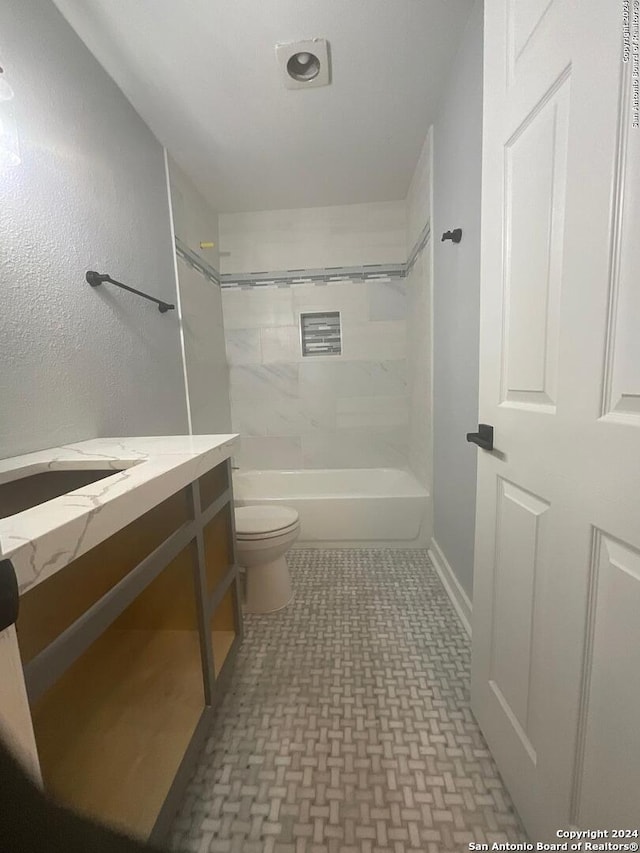 full bathroom with vanity, toilet, and shower / bathtub combination