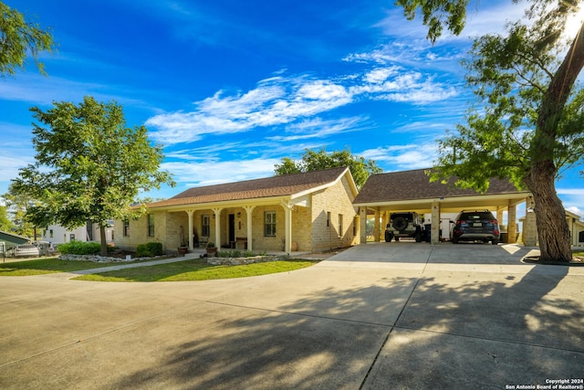 735 Hot Shot Ln, Mcqueeney, TX 78123 - ranch-style house with a porch, driveway, and brick siding