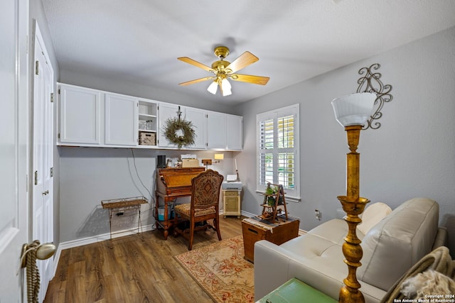 735 Hot Shot Ln, Mcqueeney, TX 78123 - office with a ceiling fan, baseboards, and dark wood-type flooring