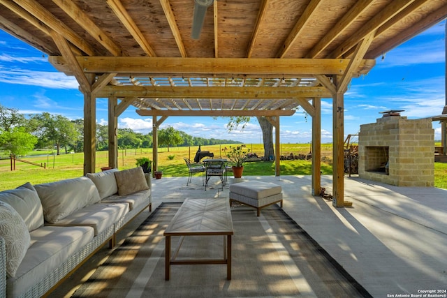 735 Hot Shot Ln, Mcqueeney, TX 78123 - view of patio featuring outdoor dining space and an outdoor living space with a fireplace