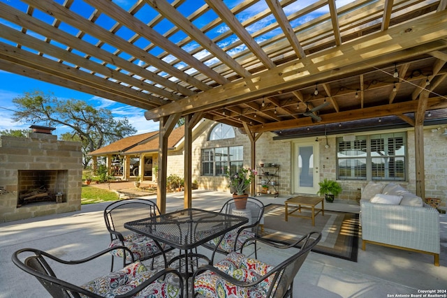 735 Hot Shot Ln, Mcqueeney, TX 78123 - view of patio / terrace with an outdoor living space with a fireplace and a pergola