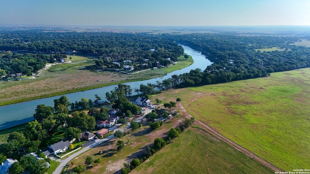 735 Hot Shot Ln, Mcqueeney, TX 78123 - bird's eye view with a rural view, a water view, and a view of trees