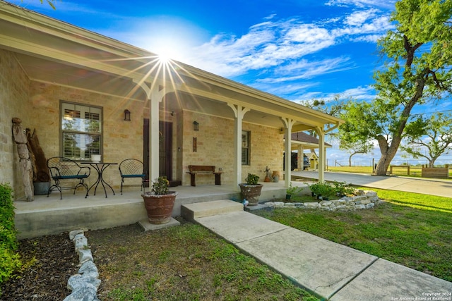 735 Hot Shot Ln, Mcqueeney, TX 78123 - property entrance featuring covered porch and a yard