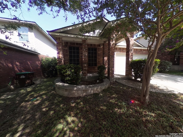 view of front of property featuring a garage