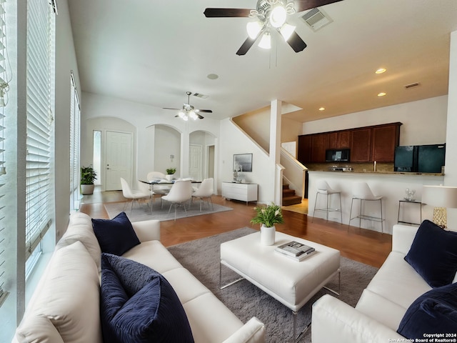 living room with ceiling fan