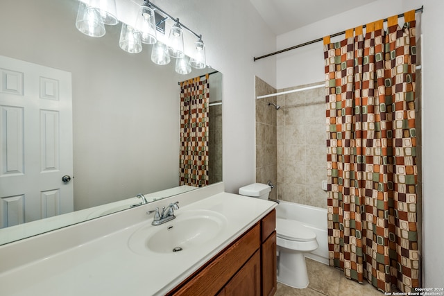 full bathroom featuring vanity, toilet, tiled shower / bath combo, and tile patterned floors