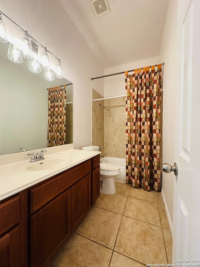 full bathroom with shower / bath combo, tile patterned flooring, toilet, and vanity