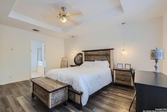206 Birchwood Bay, San Antonio, TX 78253 - bedroom with dark wood-type flooring, a tray ceiling, visible vents, and crown molding