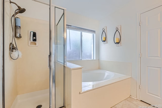 bathroom with tile patterned flooring and plus walk in shower