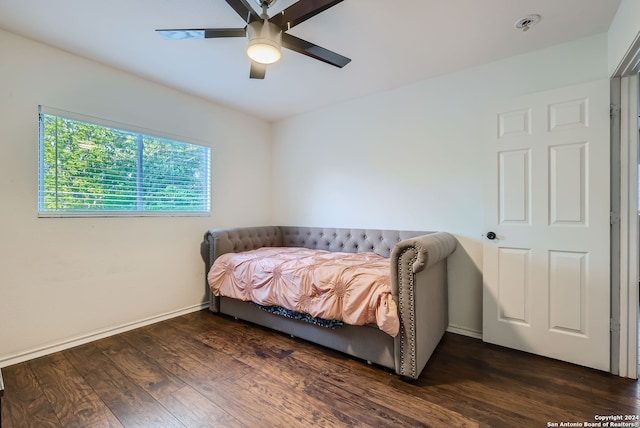 bedroom featuring ceiling fan and hardwood / wood-style floors