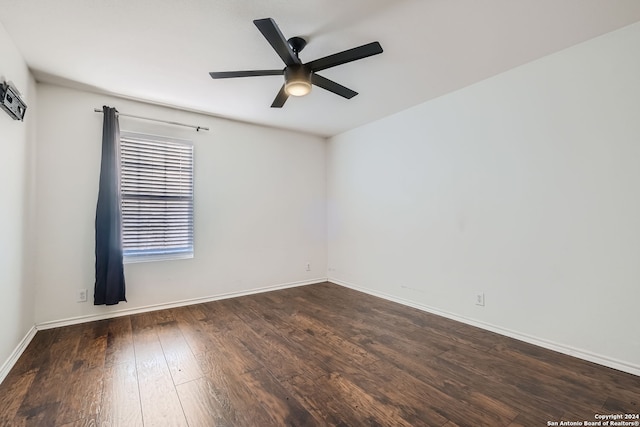 empty room featuring ceiling fan and hardwood / wood-style flooring