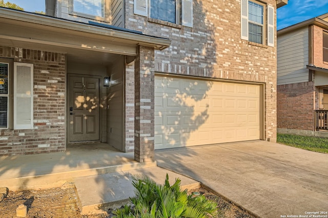 property entrance with a garage