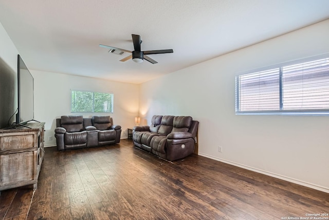 206 Birchwood Bay, San Antonio, TX 78253 - living room featuring baseboards, visible vents, ceiling fan, and dark wood-style flooring