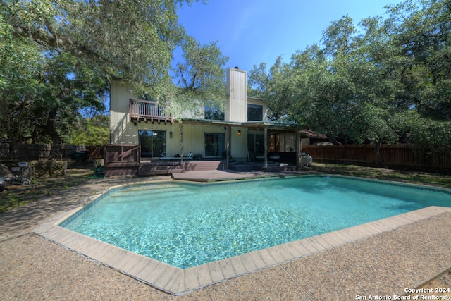 view of swimming pool with a patio area