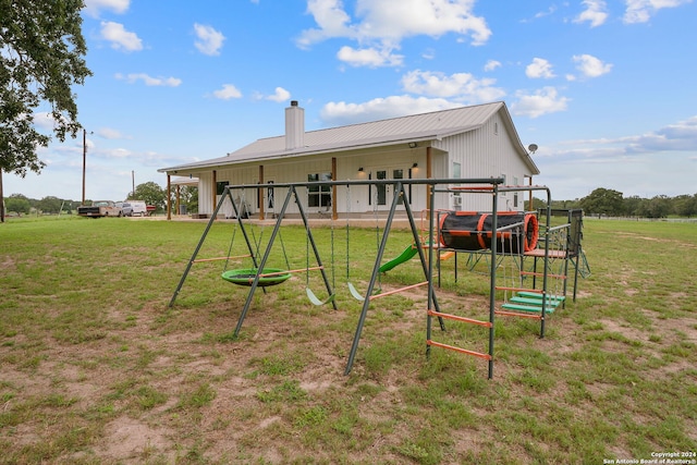 view of jungle gym with a yard