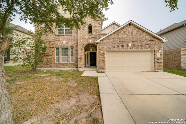 view of front of property featuring a garage