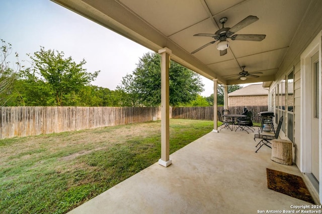 view of patio featuring ceiling fan and a fenced backyard