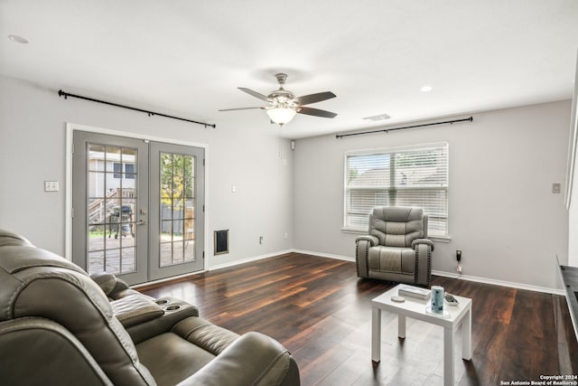 living room featuring ceiling fan, a healthy amount of sunlight, french doors, and dark hardwood / wood-style floors