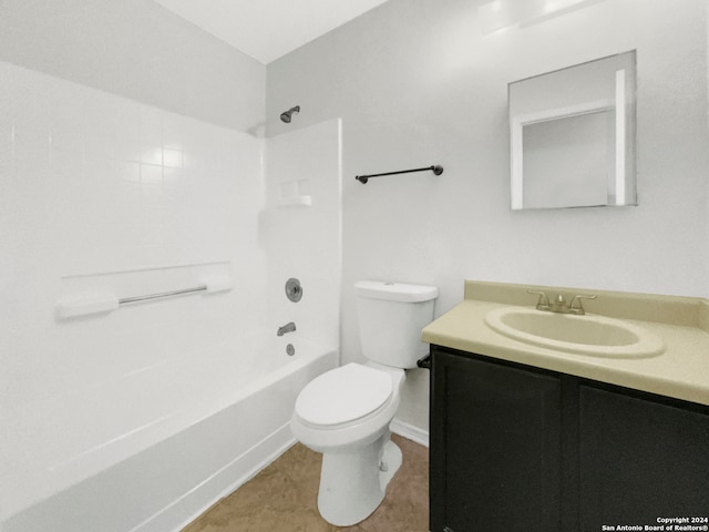 full bathroom with vanity, toilet, washtub / shower combination, and tile patterned flooring