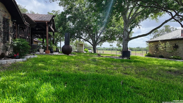 view of yard with fence