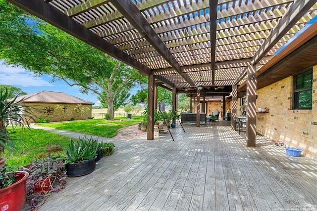 view of patio with a pergola and a wooden deck