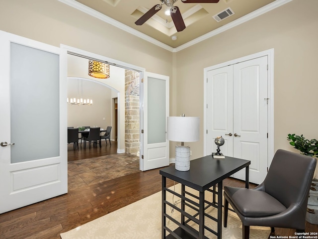 office with dark hardwood / wood-style flooring, ceiling fan with notable chandelier, and ornamental molding