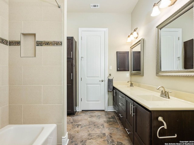 bathroom featuring tile patterned floors and vanity