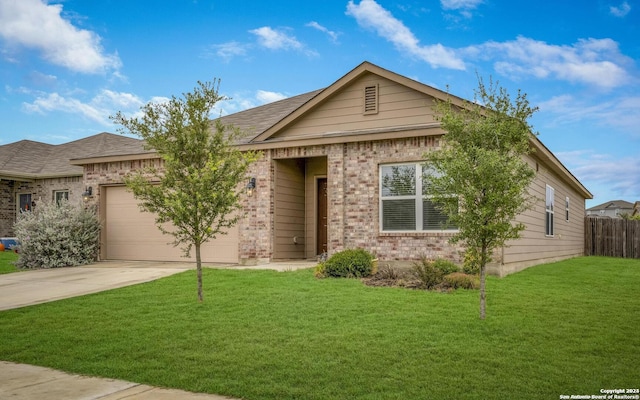 ranch-style home featuring a garage, brick siding, fence, driveway, and a front yard