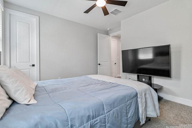 bedroom with ceiling fan and carpet flooring