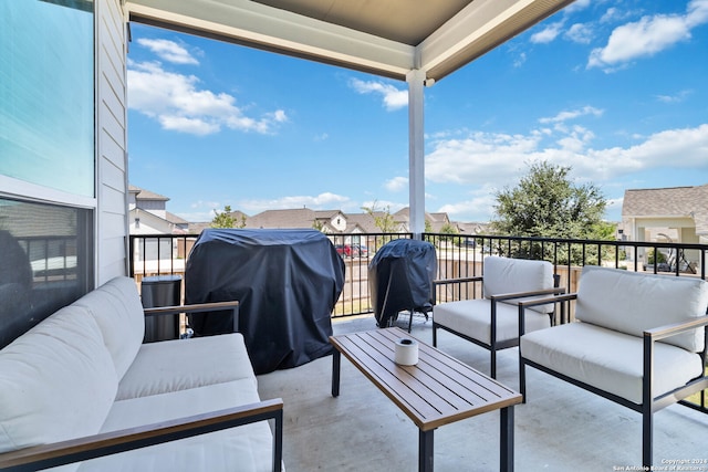 balcony featuring an outdoor living space and a grill