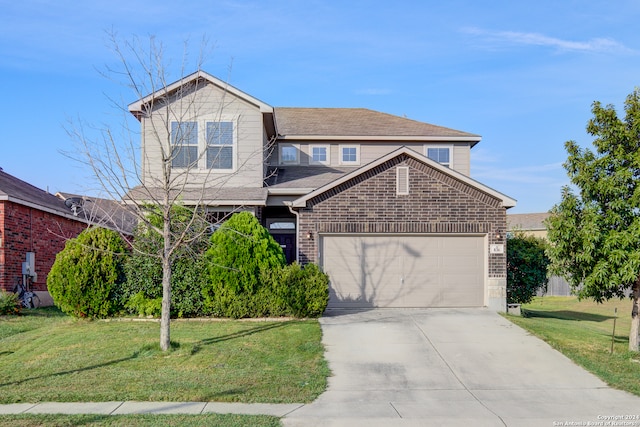 view of front facade featuring a front lawn and a garage