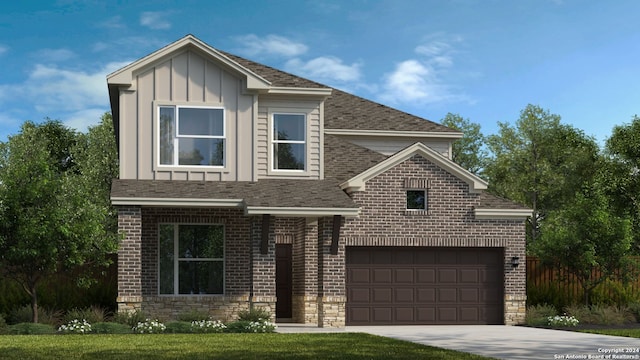 view of front of house with a garage and a front lawn