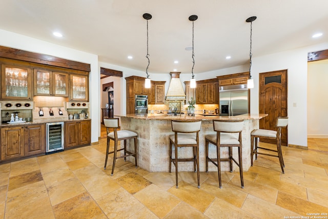 kitchen with stainless steel appliances, wine cooler, light tile patterned flooring, a breakfast bar area, and tasteful backsplash