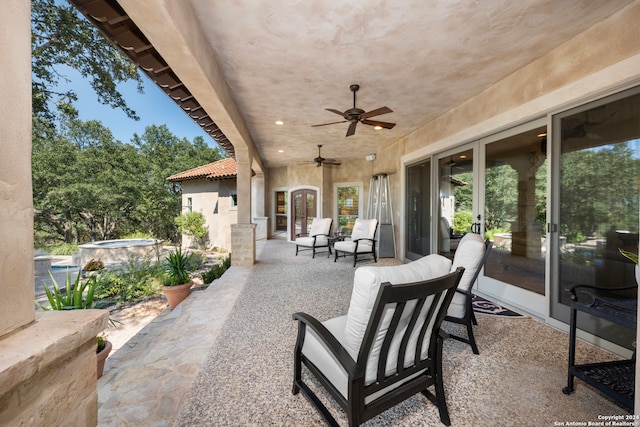 view of patio / terrace featuring an outdoor living space and ceiling fan