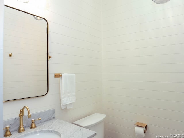 bathroom with toilet and sink