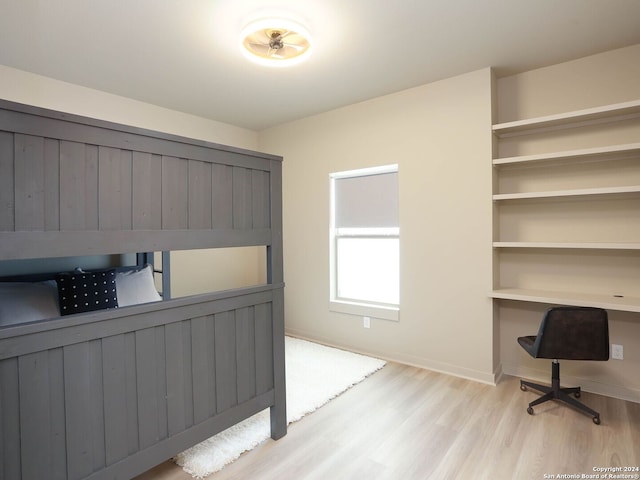 bedroom with light hardwood / wood-style flooring