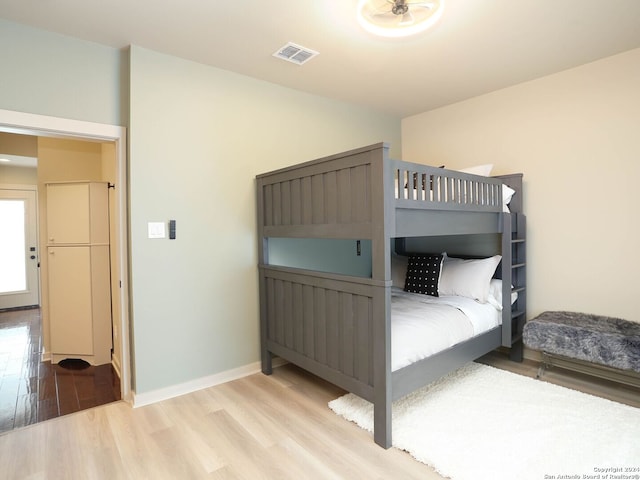 bedroom featuring light wood-type flooring