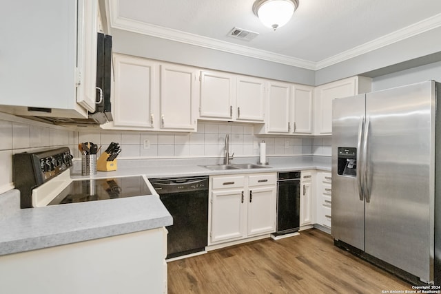 kitchen with black dishwasher, sink, white cabinetry, stove, and stainless steel refrigerator with ice dispenser