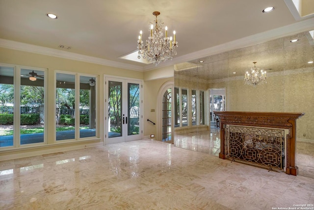 interior space featuring ceiling fan with notable chandelier, french doors, and crown molding