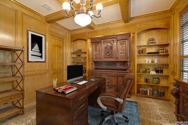 office space featuring ornamental molding, built in features, an inviting chandelier, and carpet flooring