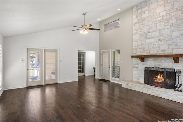 unfurnished living room featuring high vaulted ceiling, ceiling fan, a fireplace, and dark hardwood / wood-style floors