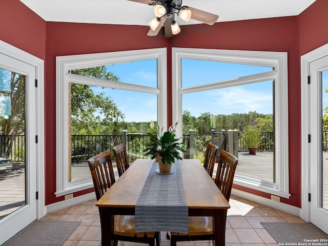 dining room with ceiling fan and light tile patterned floors